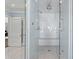 Large walk-in shower with marble tile and glass enclosure at 930 E 7Th Ave, Denver, CO 80218