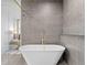 Relaxing bathroom with stylish tub and fixtures at 1587 Arrowpoint Ct, Franktown, CO 80116