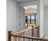 Hallway showing the gorgeous finishes and chandelier in the nearby bedroom at 1587 Arrowpoint Ct, Franktown, CO 80116