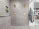 Open shower featuring double shower heads and sleek fixtures at 1587 Arrowpoint Ct, Franktown, CO 80116