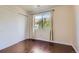 Bedroom with closet and natural light from the window with trees at 2223 S Buckley Rd # 102, Aurora, CO 80013