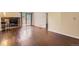 Spacious living area with brick fireplace, hardwood floors, and bright natural light at 2223 S Buckley Rd # 102, Aurora, CO 80013