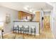 Open kitchen and living area with a bar and seating at 3030 Wyandot St # 4, Denver, CO 80211