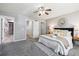 Bright and airy main bedroom featuring plush carpet, ensuite bath access, and a large walk-in closet at 3030 Wyandot St # 4, Denver, CO 80211