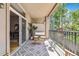 Relaxing outdoor patio featuring stylish outdoor furniture and view through the trees at 3030 Wyandot St # 4, Denver, CO 80211