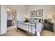 Bedroom view to bathroom showcases elegant fixtures and well-lit space at 903 W 129Th Pl, Westminster, CO 80234