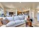 Open-concept living space with a modern kitchen and dining area for easy entertaining at 903 W 129Th Pl, Westminster, CO 80234