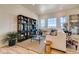 Cozy living room with large windows, stylish decor, and ample natural light at 903 W 129Th Pl, Westminster, CO 80234