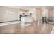 Bright and airy living room with an open view of the kitchen at 903 W 129Th Pl, Westminster, CO 80234