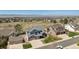 Expansive aerial view of the home's location, showcasing its proximity to a thriving neighborhood and natural landscape at 9895 Wyecliff Dr, Highlands Ranch, CO 80126