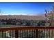 Scenic view from the deck showcasing the surrounding landscape and mountains at 9895 Wyecliff Dr, Highlands Ranch, CO 80126