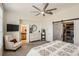 Spacious main bedroom with ensuite bathroom and large closet with sliding barn door at 9486 Elmhurst Ln # D, Highlands Ranch, CO 80129