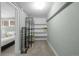 Walk-in closet with ample shelving providing plenty of storage space at 2430 S Ogden St, Denver, CO 80210