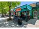 Charming restaurant exterior with outdoor seating and a vibrant, inviting atmosphere at 2430 S Ogden St, Denver, CO 80210