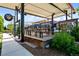 Outdoor patio area for Denver Beer Co. with shaded seating, picnic tables and ample space to enjoy local brews at 2430 S Ogden St, Denver, CO 80210