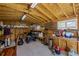Interior of shed with tiled floor, pegboard, shelves, and window, offering well-organized storage solutions at 2430 S Ogden St, Denver, CO 80210