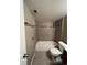 Bathroom featuring neutral colors and tile in the shower at 16136 E Exposition Dr, Aurora, CO 80017
