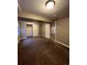 A clean bedroom featuring plush carpeting and a spacious closet for ample storage at 16136 E Exposition Dr, Aurora, CO 80017
