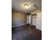 Neutral bedroom with closet and carpet at 16136 E Exposition Dr, Aurora, CO 80017