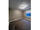 Finished bedroom with a large window and neutral walls at 16136 E Exposition Dr, Aurora, CO 80017