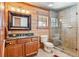 Bathroom with a vanity, mirror, toilet and glass enclosed shower at 351 Kimmes Ln, Breckenridge, CO 80424