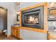 Bathroom featuring a fireplace, vanity, and toilet with tile flooring at 351 Kimmes Ln, Breckenridge, CO 80424