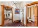 Hallway with rustic wooden accents, bench and tree-like coat rack at 351 Kimmes Ln, Breckenridge, CO 80424