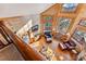 Open living room with wood walls and multiple windows providing natural light and views at 351 Kimmes Ln, Breckenridge, CO 80424