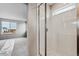 Clean bathroom with a shower and window at 5700 Ranch St, Mead, CO 80504
