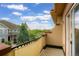 Balcony view overlooking a neighborhood and grassy field from this attractive property at 7777 E 23Rd Ave # 401, Denver, CO 80238