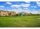 Beautiful park with green grass, mature trees, and community landscaping near townhomes at 7777 E 23Rd Ave # 401, Denver, CO 80238