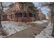 Side view of building showcasing architectural details and landscaping at 1441 N Pennsylvania St # 3, Denver, CO 80203