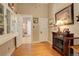 Hallway with hardwood floors, decorative fireplace, and built-in shelving at 1441 N Pennsylvania St # 3, Denver, CO 80203