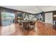 Entertaining basement with game table, fireplace, and sliding patio door at 27423 E Euclid Dr, Aurora, CO 80016