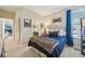 This bedroom features a mountain themed decor, a connecting bathroom, and a window view at 27423 E Euclid Dr, Aurora, CO 80016