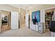 Bright bedroom featuring a modern, artistic decor and neutral walls at 27423 E Euclid Dr, Aurora, CO 80016