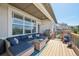 Upper level deck with outdoor seating and grill, and views of the neighborhood at 27423 E Euclid Dr, Aurora, CO 80016