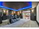 Home theater with starry ceiling leading into basement game room with pool table at 27423 E Euclid Dr, Aurora, CO 80016