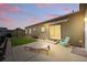 Exterior backyard showcasing a patio with furniture, storage shed and lawn at 6231 Indian Paintbrush St # 214, Frederick, CO 80530