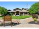 Charming community clubhouse boasts well-maintained landscaping and welcoming entrance at 6231 Indian Paintbrush St # 214, Frederick, CO 80530