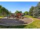 Community playground with slides, climbing structures, and ample play area at 6231 Indian Paintbrush St # 214, Frederick, CO 80530