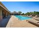 Inviting outdoor community pool features plenty of seating and a nearby clubhouse at 6231 Indian Paintbrush St # 214, Frederick, CO 80530
