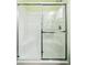 All-white shower stall with glass doors and chrome fixtures at 6231 Indian Paintbrush St # 214, Frederick, CO 80530
