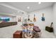 Finished basement with an open floor plan includes a living space and music area at 5078 S Quail St, Littleton, CO 80127