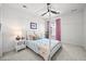 Bright bedroom features a four-poster bed frame and minimalist decorations at 5078 S Quail St, Littleton, CO 80127