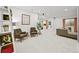 Spacious living room featuring neutral colors, recessed lights, and modern decor at 5078 S Quail St, Littleton, CO 80127
