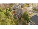 Aerial view of a two-story home with a lush backyard and mature trees at 6132 S Boston Cir, Englewood, CO 80111