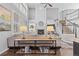 Bright living room with fireplace, large windows, and elegant decor at 6132 S Boston Cir, Englewood, CO 80111
