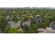 Aerial view of a residential area, showcasing the property amidst lush greenery and neighborhood streets at 6132 S Boston Cir, Greenwood Village, CO 80111