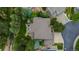 Overhead view of home with an outdoor firepit, patio, and surrounding landscaping at 6132 S Boston Cir, Greenwood Village, CO 80111